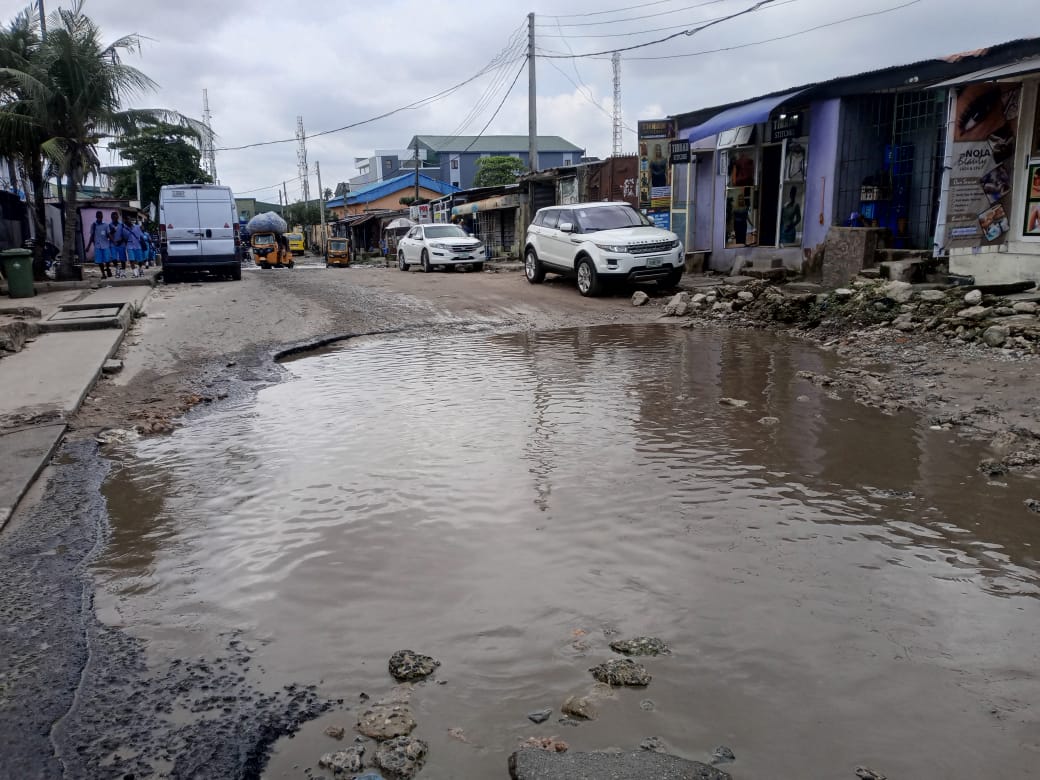 Oyadiran estate residents groan over collapsed road, perennial flooding
