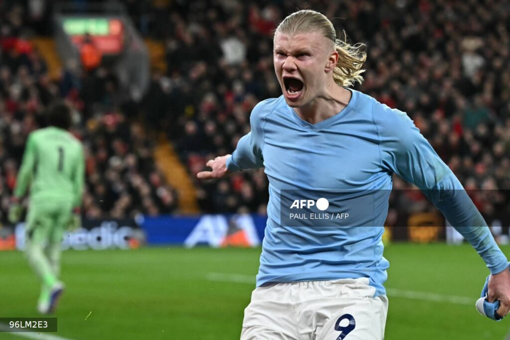 Haaland’s stoppage-time penalty delivers rare Manchester City win at Anfield