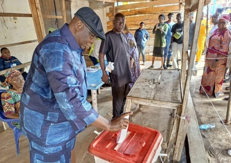Former presidential aide Babafemi Ojudu casts vote in Ekiti governorship election