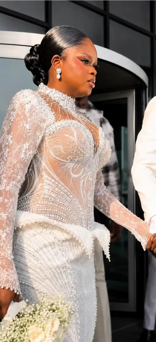 Jarvis stuns as she walks down aisle to marry Peller